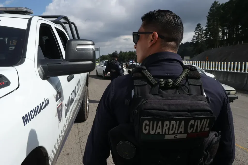 Autoridades de seguridad de Michoacán durante presentación de cifras sobre reducción de homicidios.