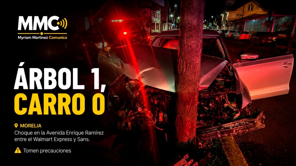 Vehículo con severos daños en la parte frontal luego de impactarse contra un árbol sobre la avenida Enrique Ramírez, en Morelia, mientras cuerpos de emergencia realizan labores de atención.