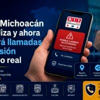 Pantalla de un teléfono móvil con la App 911 Michoacán y una alerta preventiva de seguridad.